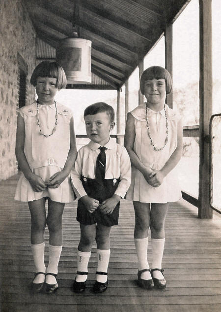 Caldow children of Three Springs with hanging round meat safe in the background